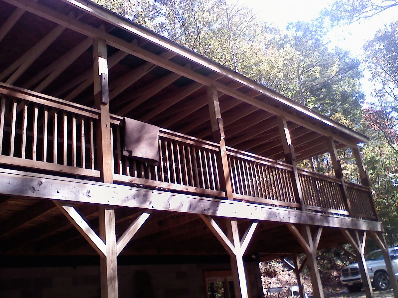 Timber framing under a new elevated porch and deck — Roof Leak Repair in Camano Island by Roofing Brothers